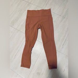 Athleta Salutation Stash Pocket II 7/8 Tight